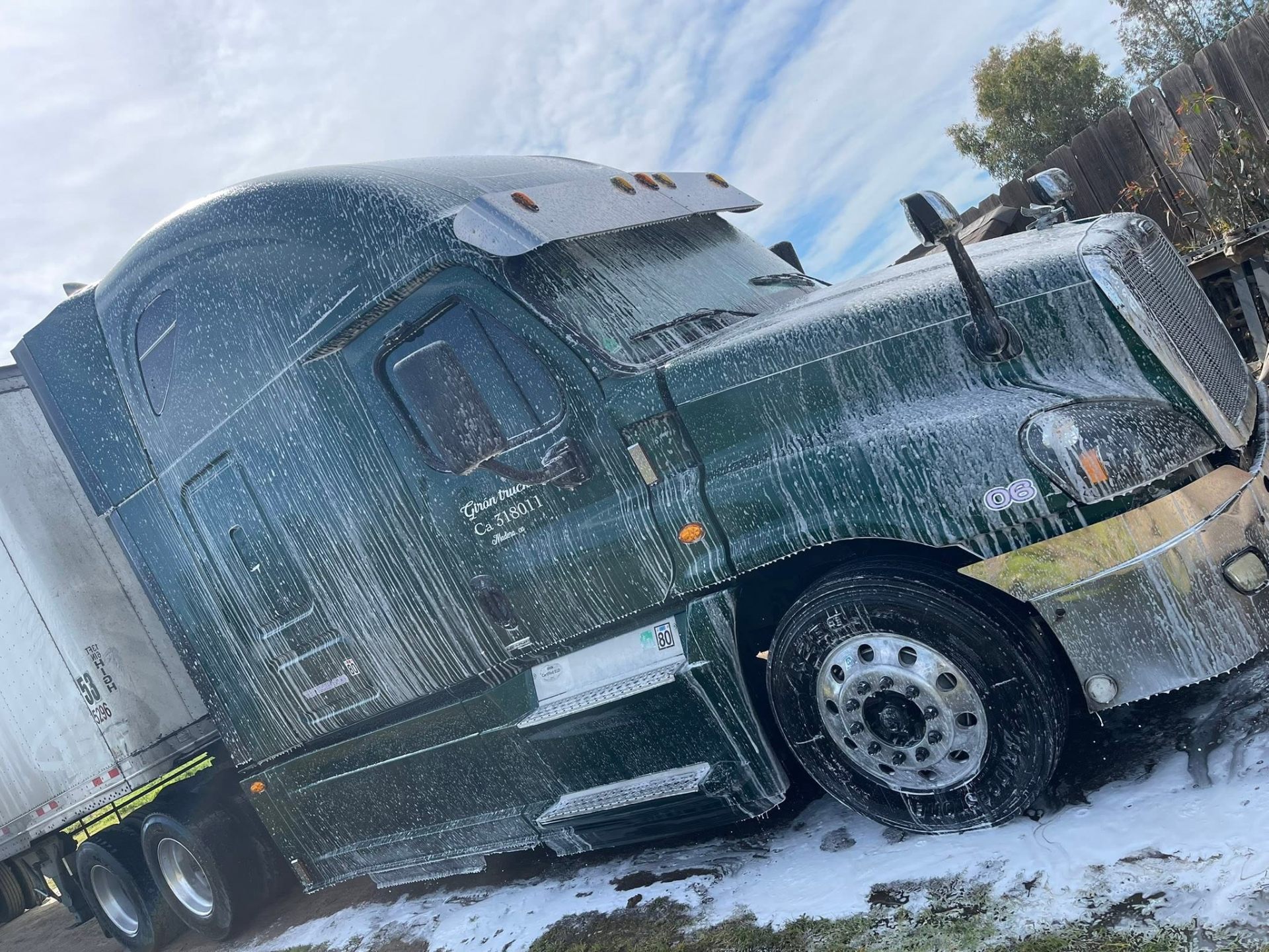 Semi-truck cab covered in foam