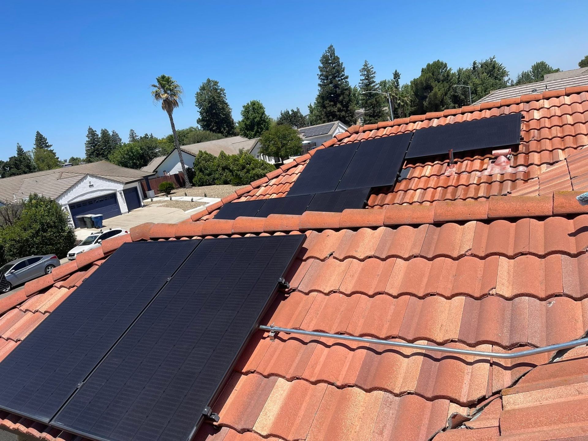 Cleaned solar panels on tile roof